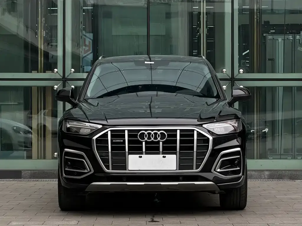 Audi Q5L — фото 10