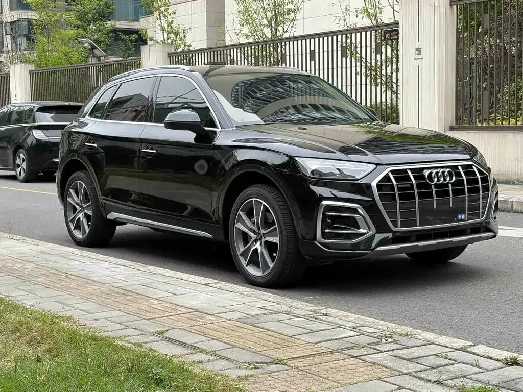 Audi Q5L — фото 8