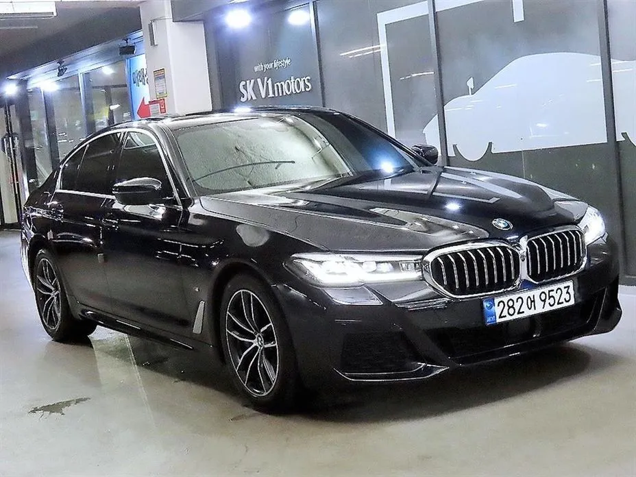 BMW 5-Series — фото 1