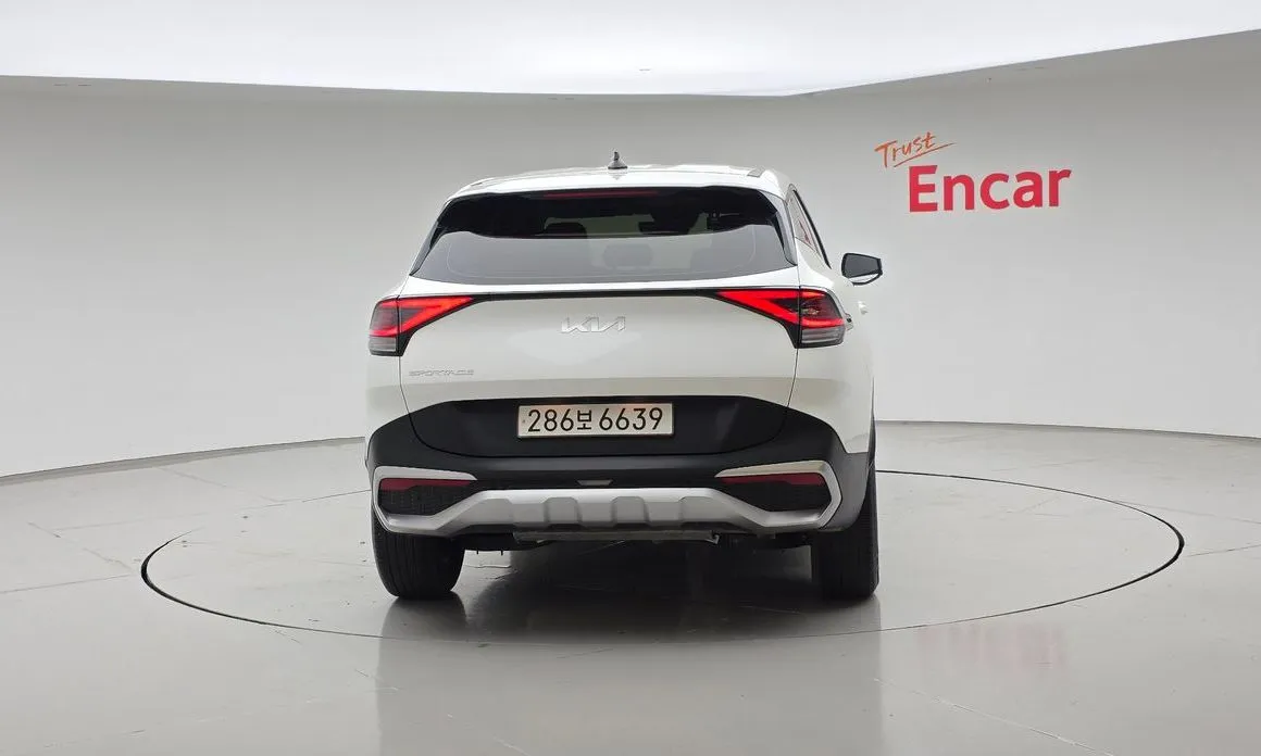 Kia Sportage — фото 7