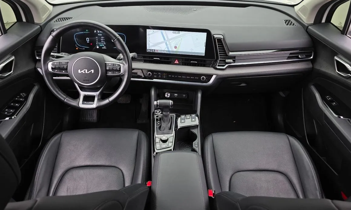 Kia Sportage — фото 9