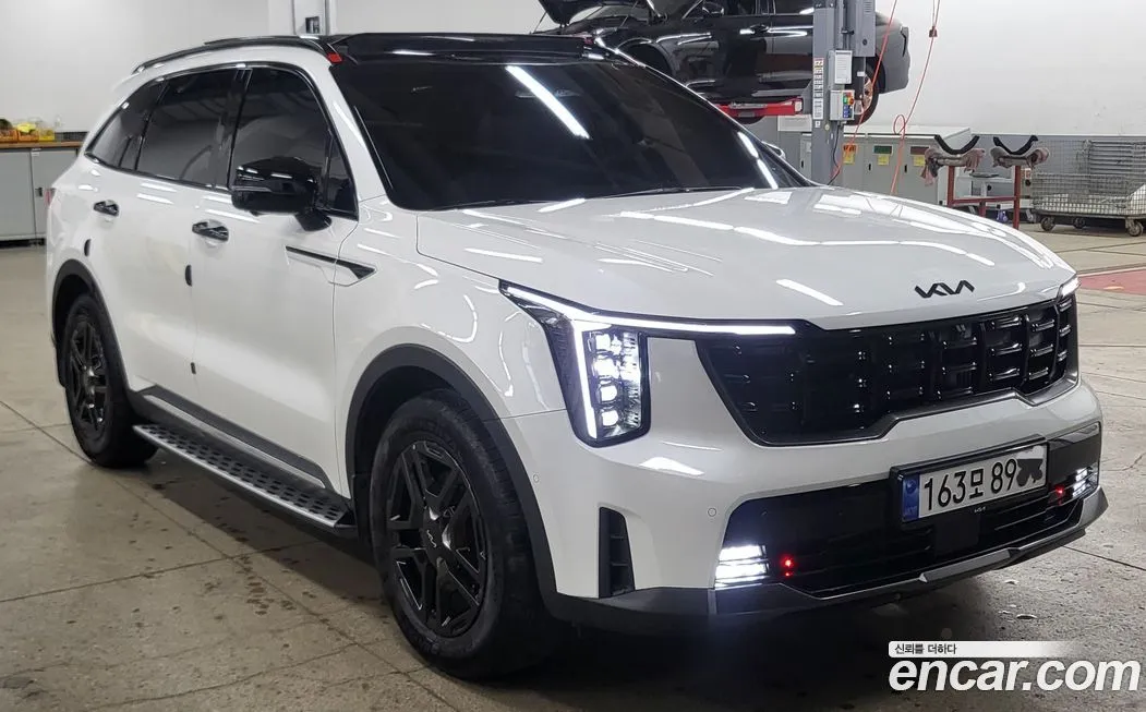 Kia Sorento — фото 7