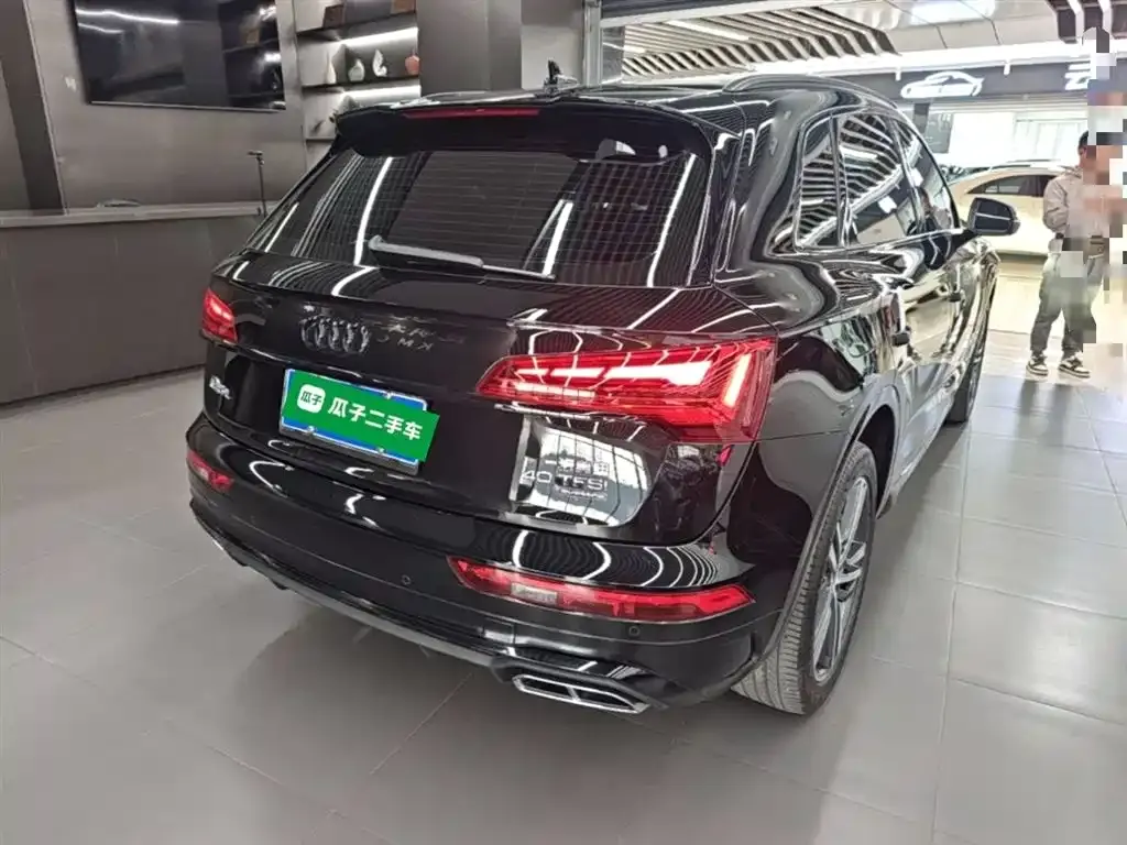 Audi Q5L — фото 10