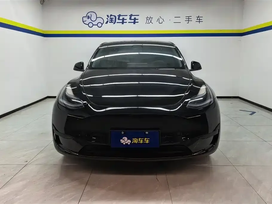 Tesla Model Y — фото 10