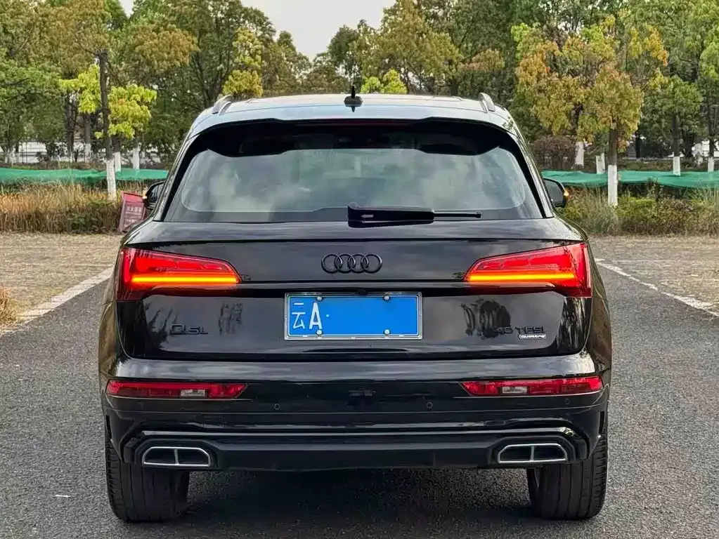Audi Q5L — фото 10