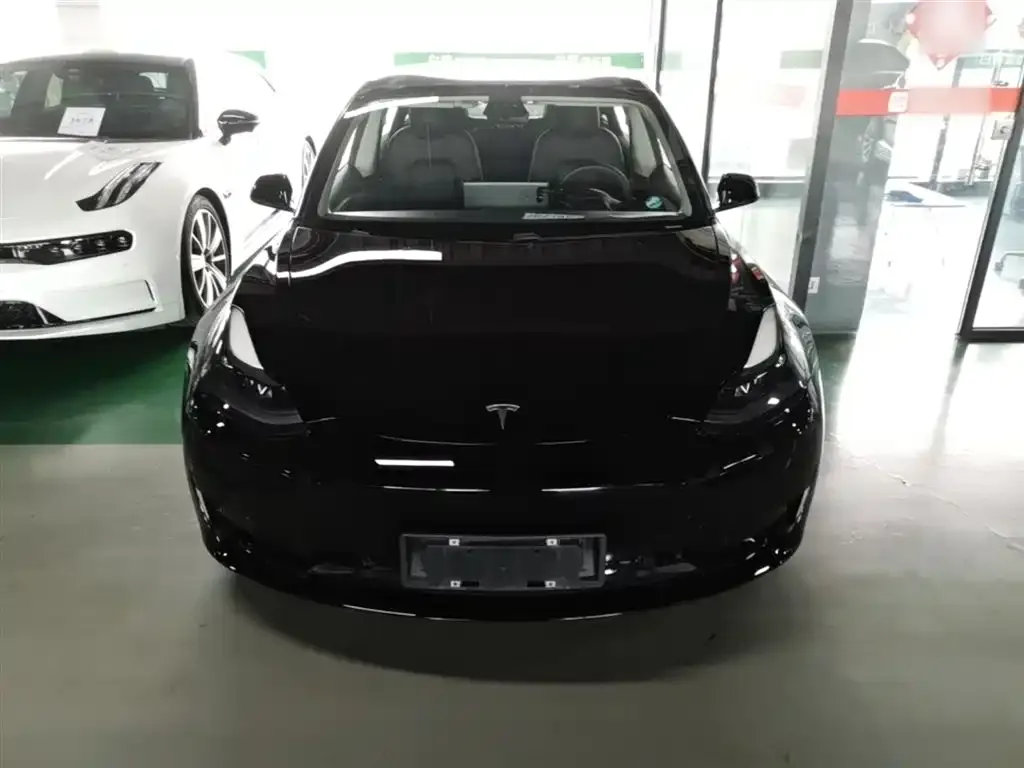 Tesla Model 3 — фото 5