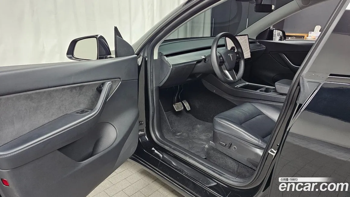 Tesla Model Y — фото 9