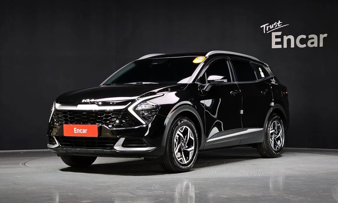 Kia Sportage — фото 1