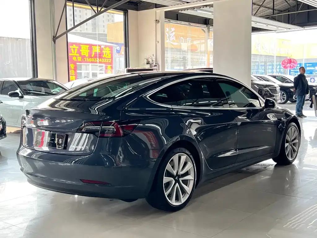 Tesla Model 3 — фото 8