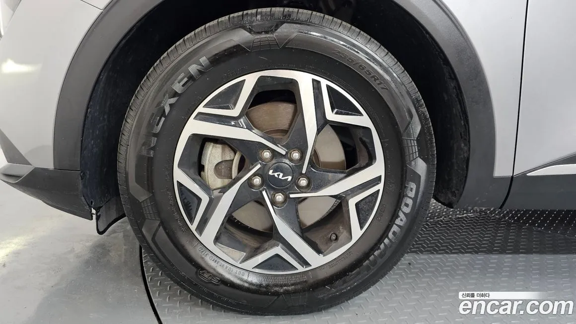 Kia Sportage — фото 9