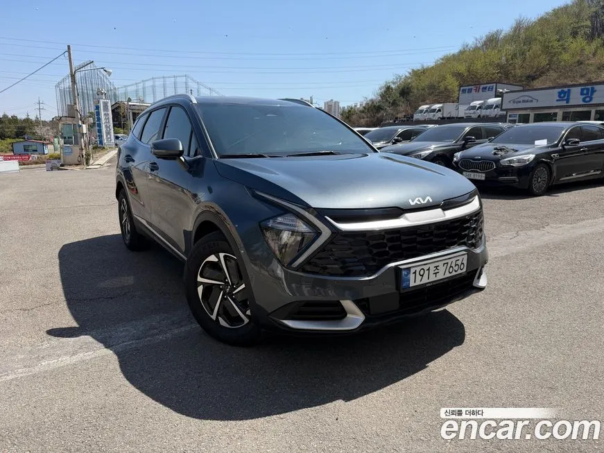 Kia Sportage — фото 1