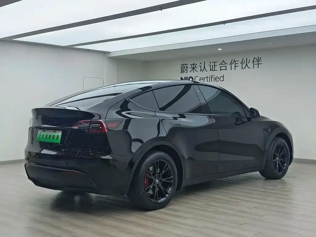 Tesla Model Y — фото 7
