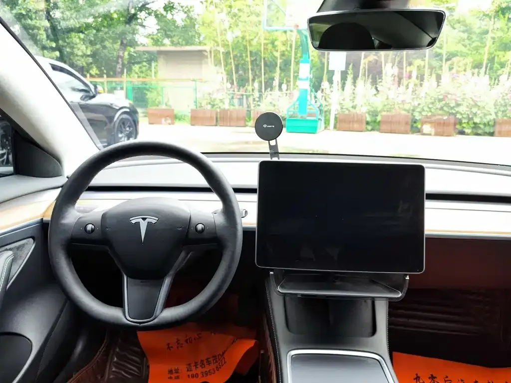 Tesla Model 3 — фото 10