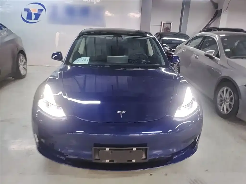Tesla Model 3 — фото 8
