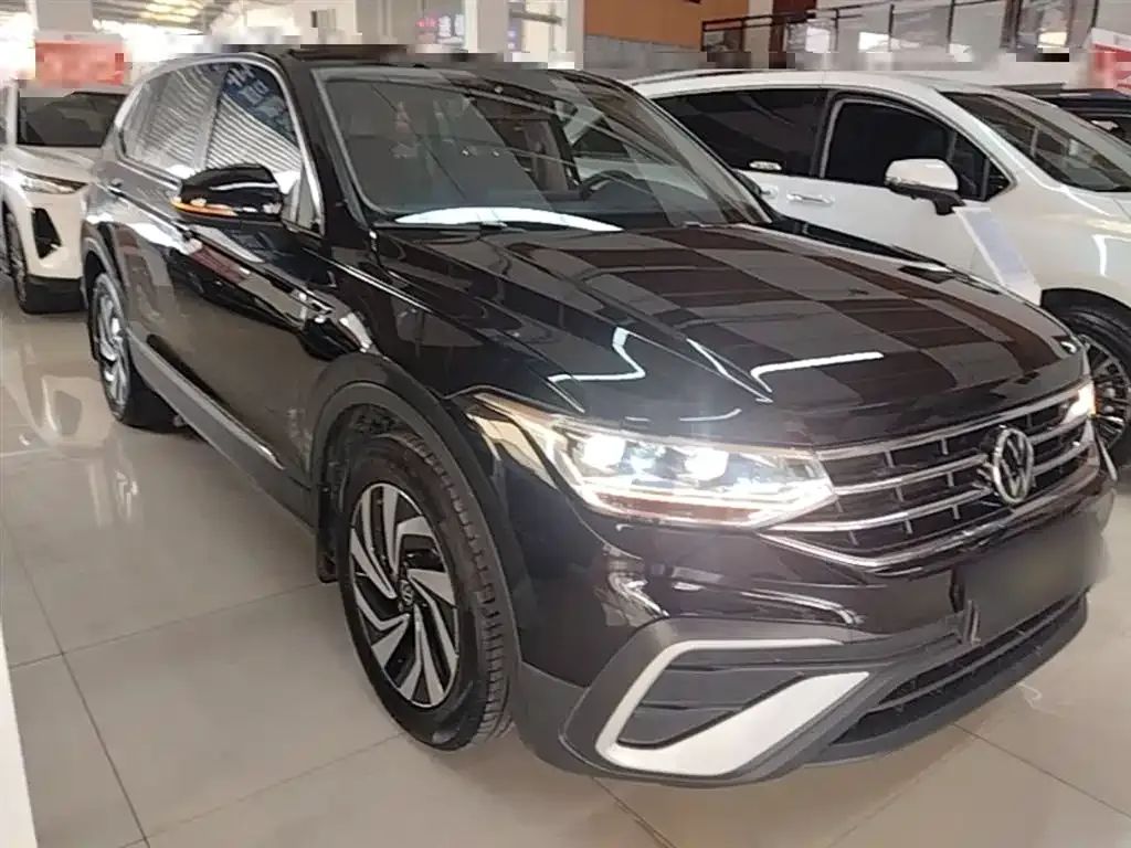 Volkswagen Tiguan L — фото 5