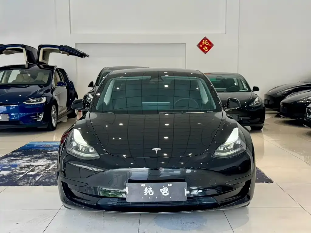 Tesla Model 3 — фото 10