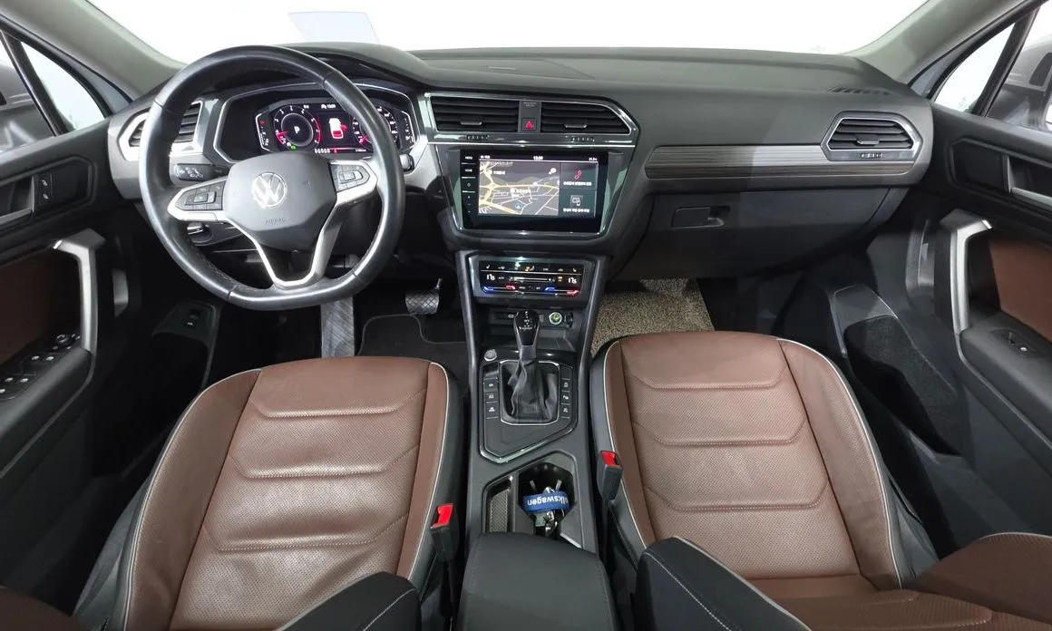 Volkswagen Tiguan — фото 7