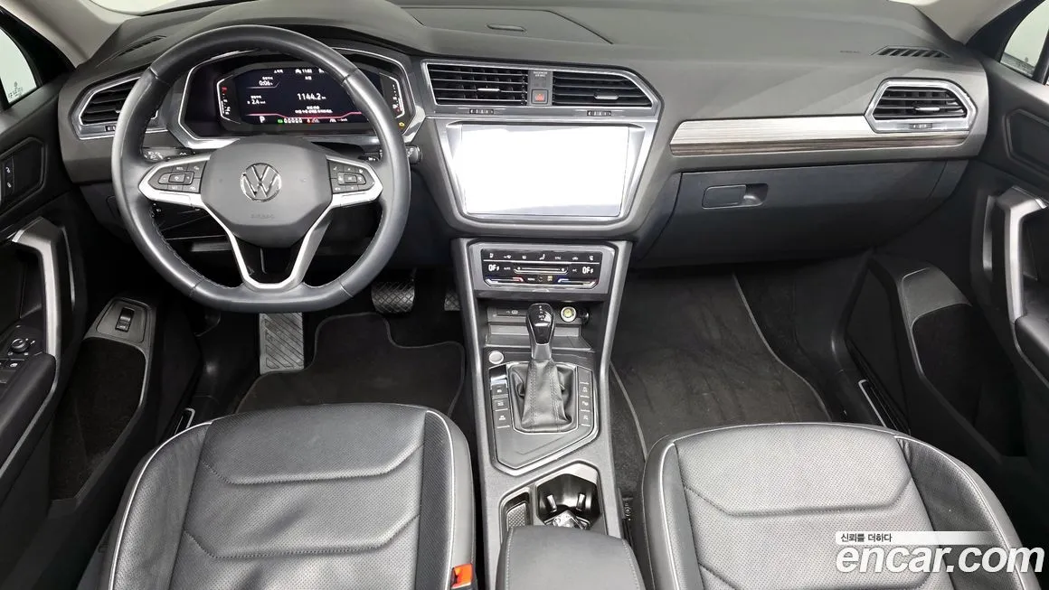 Volkswagen Tiguan — фото 9