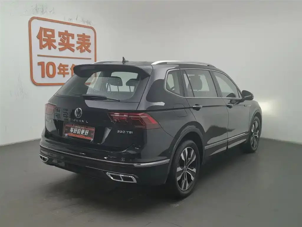 Volkswagen Tiguan L — фото 7