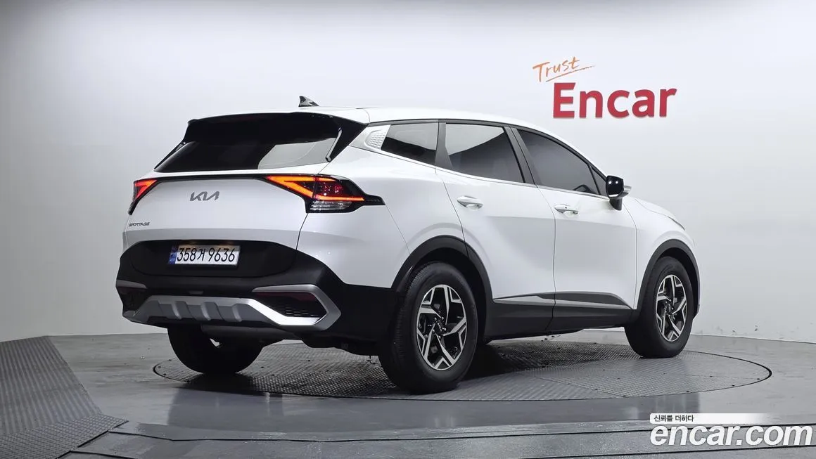 Kia Sportage — фото 8