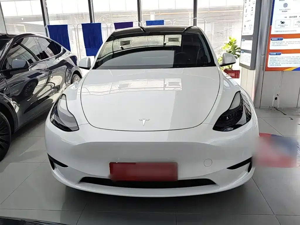 Tesla Model Y — фото 7