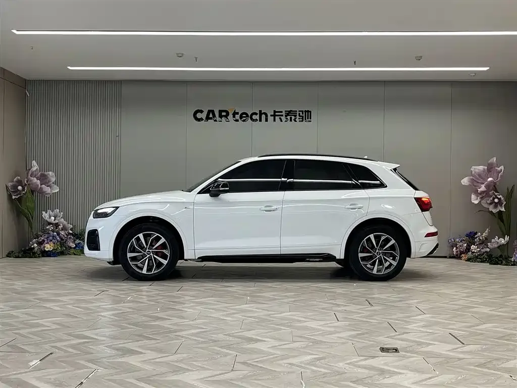Audi Q5L — фото 7