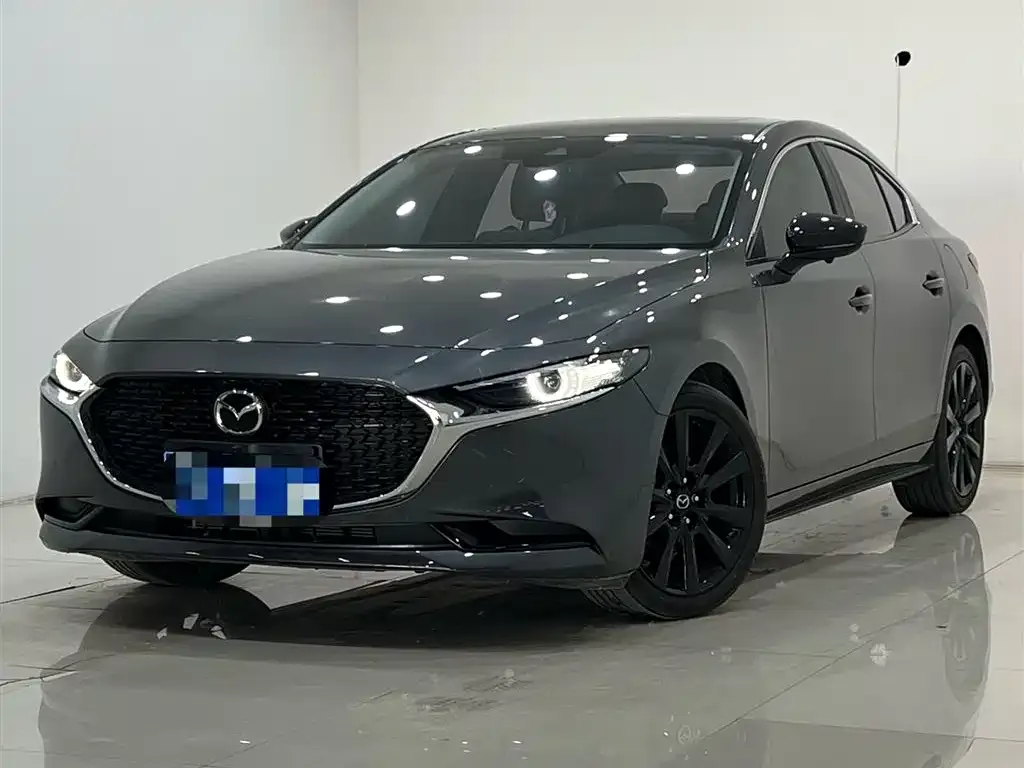 Mazda 3 Axela — фото 1