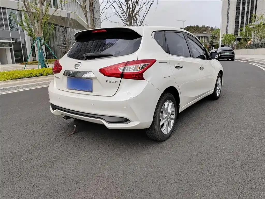 Nissan Tiida — фото 9