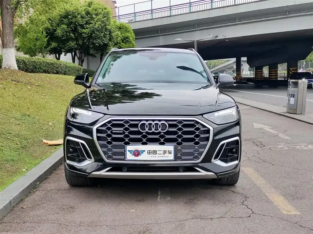 Audi Q5L — фото 10