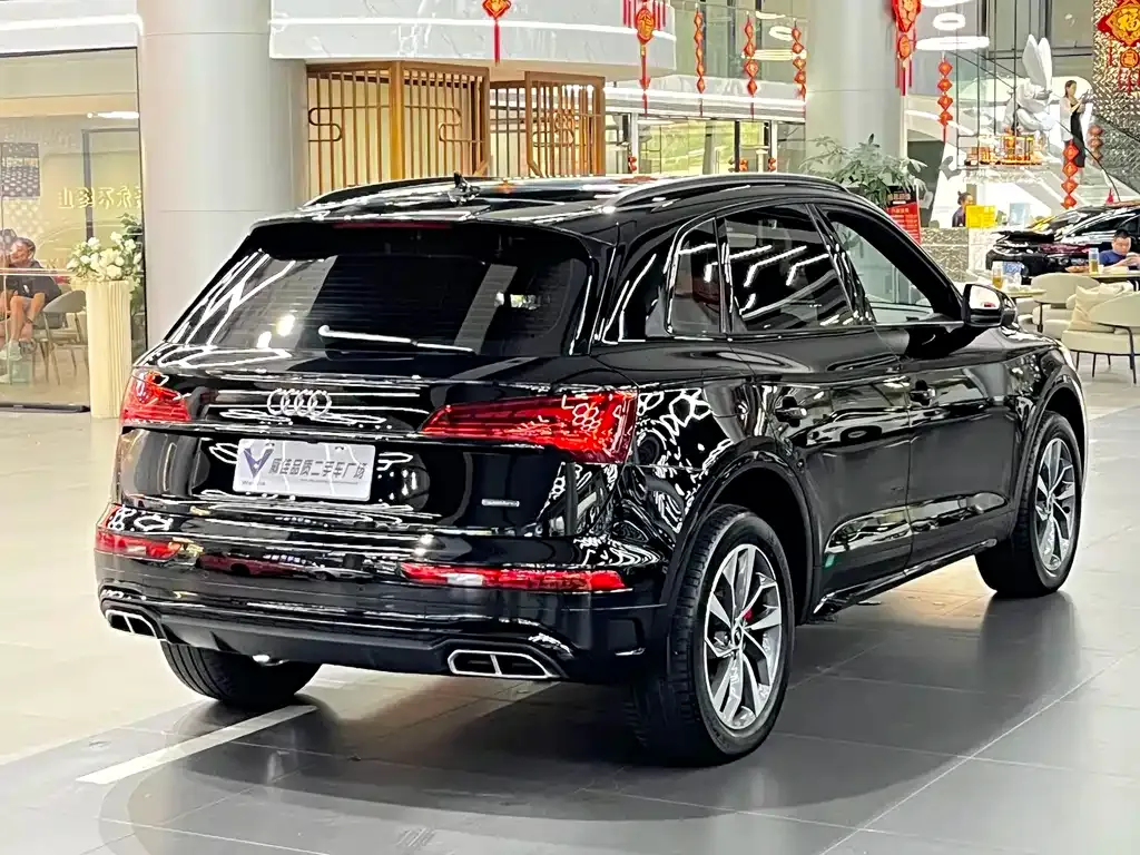 Audi Q5L — фото 5