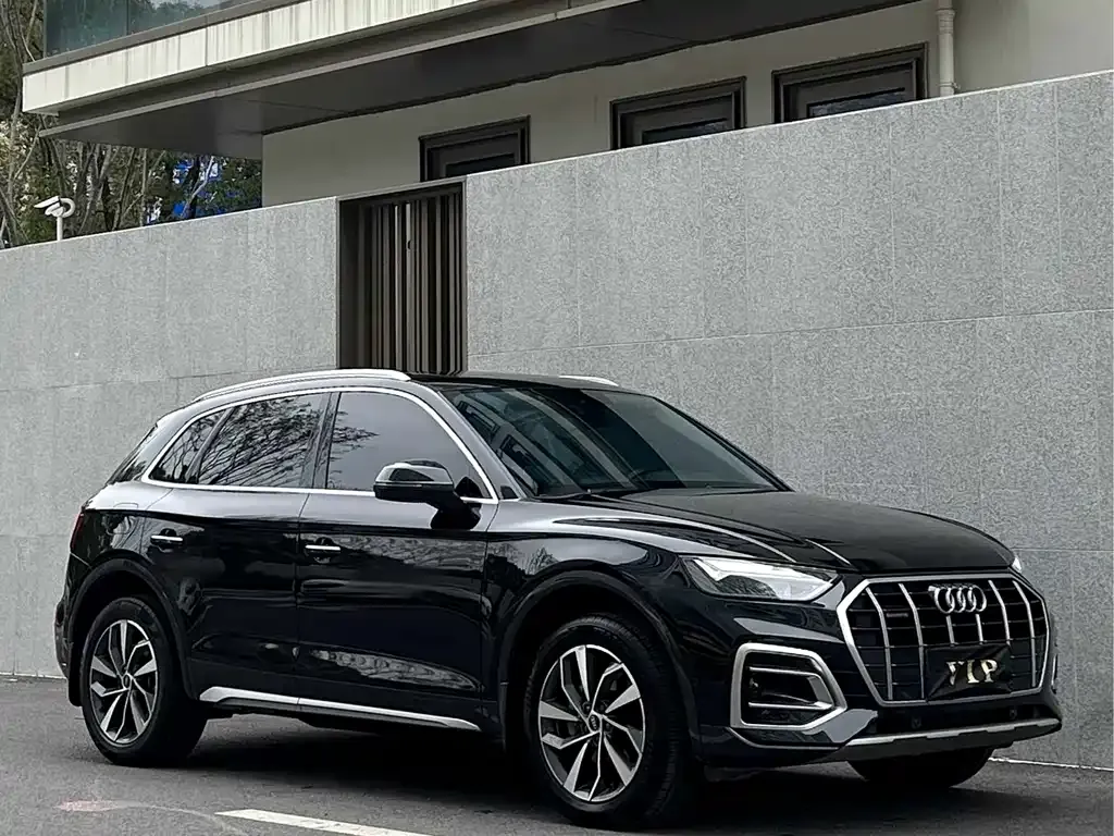 Audi Q5L — фото 10