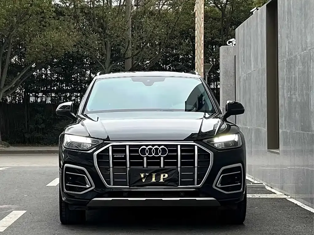 Audi Q5L — фото 5