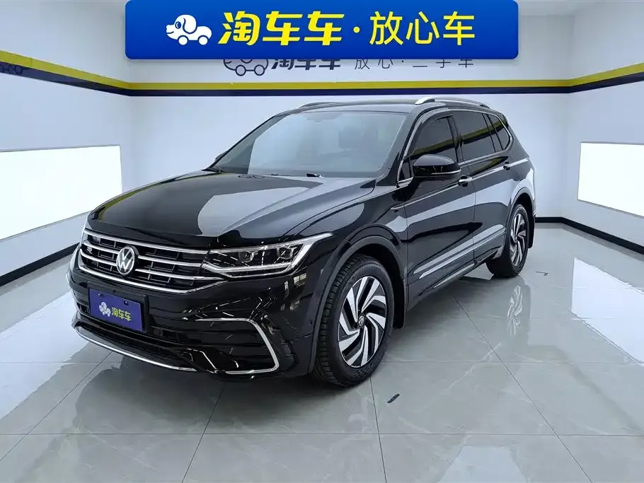 Volkswagen Tiguan L — фото 1