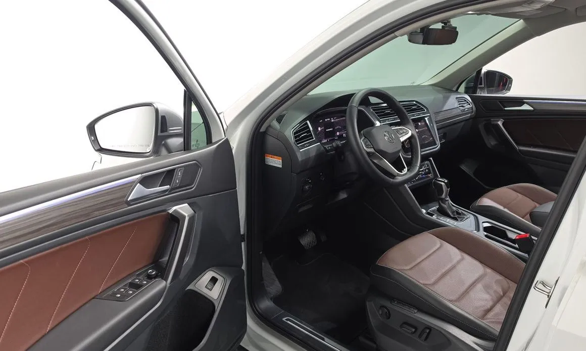 Volkswagen Tiguan — фото 10