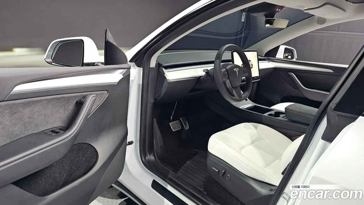Tesla Model Y — фото 7
