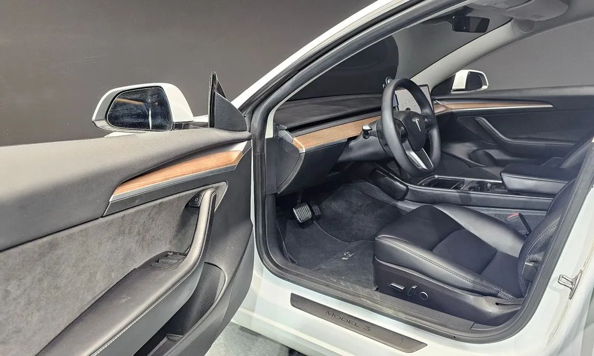 Tesla Model 3 — фото 9