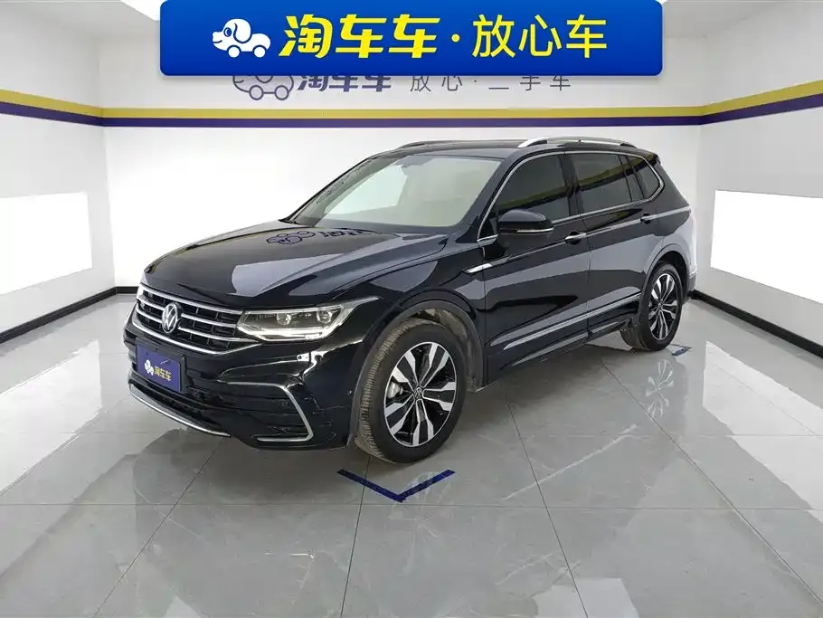 Volkswagen Tiguan L — фото 1