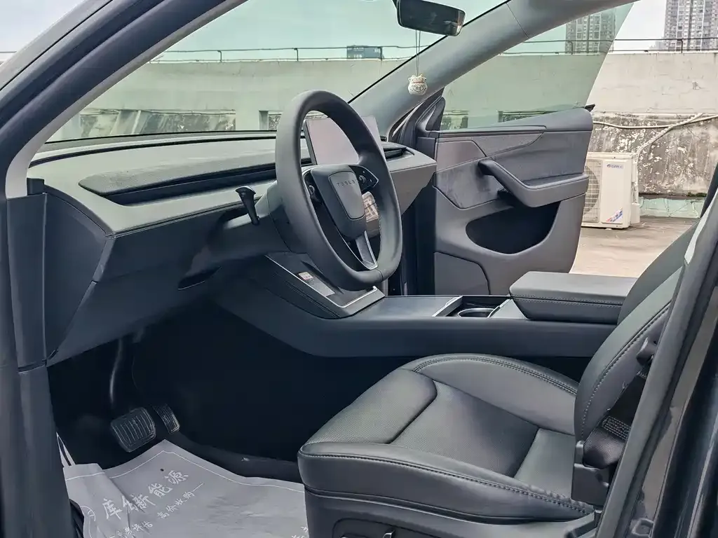 Tesla Model Y — фото 7