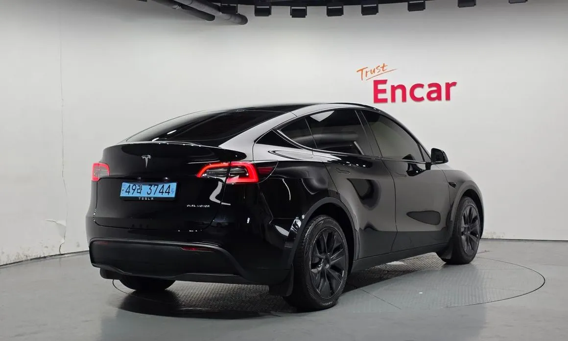 Tesla Model Y — фото 7