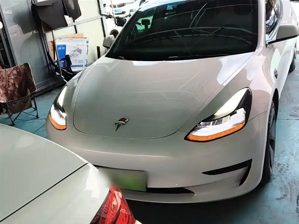 Tesla Model 3 — фото 10