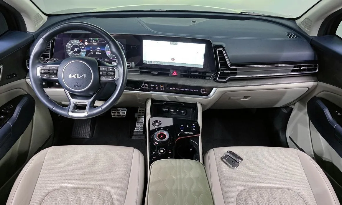 Kia Sportage — фото 10