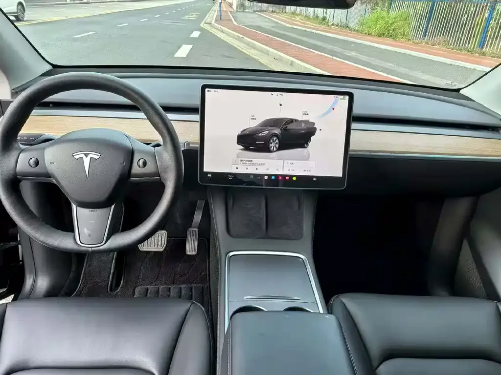 Tesla Model Y — фото 7