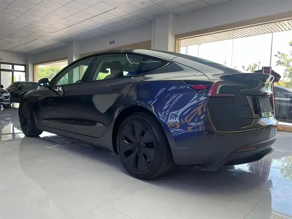 Tesla Model 3 — фото 7