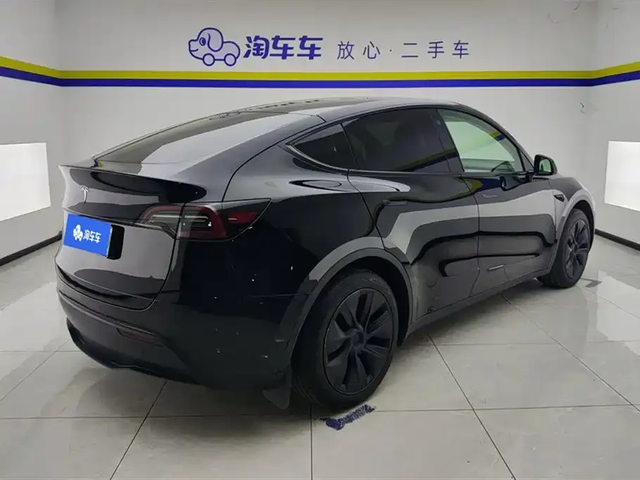 Tesla Model Y — фото 7