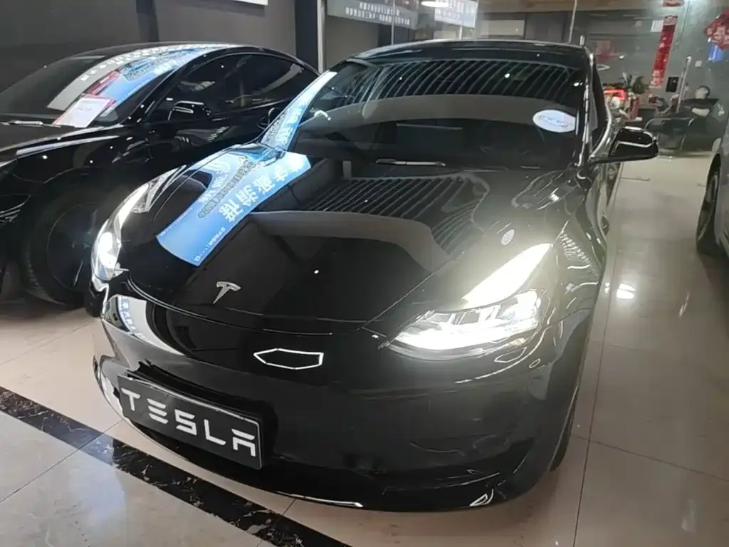 Tesla Model 3 — фото 9