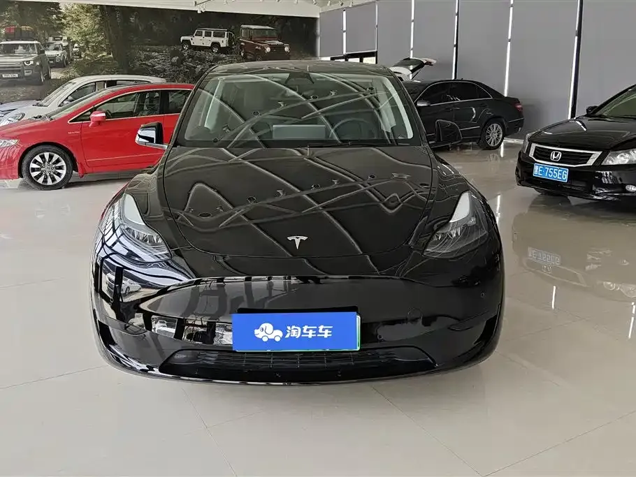 Tesla Model Y — фото 8