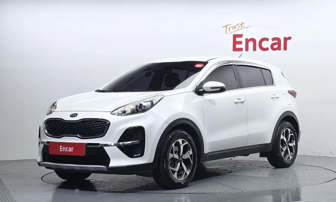 Kia Sportage — фото 1