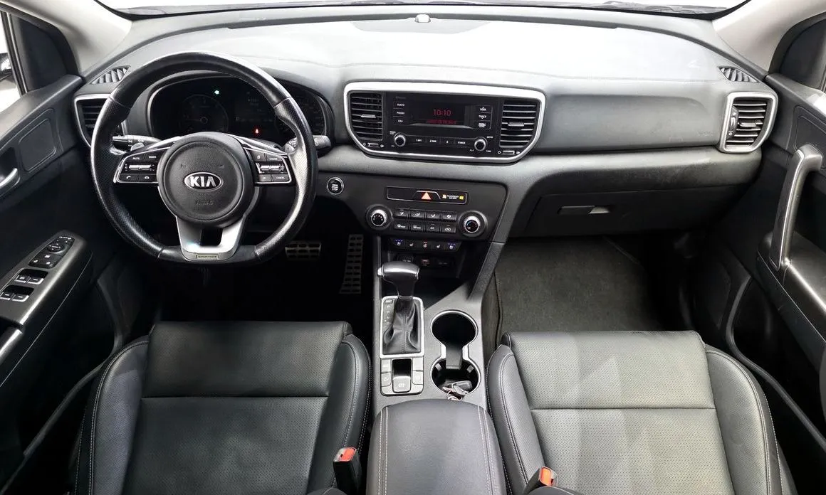 Kia Sportage — фото 10