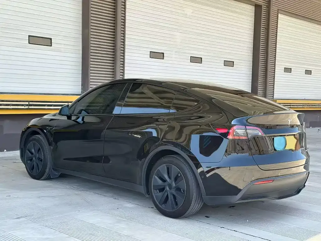 Tesla Model Y — фото 7