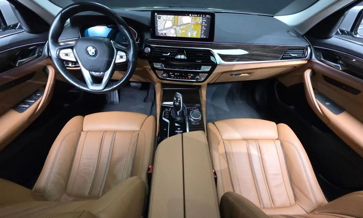 BMW 5-Series — фото 10